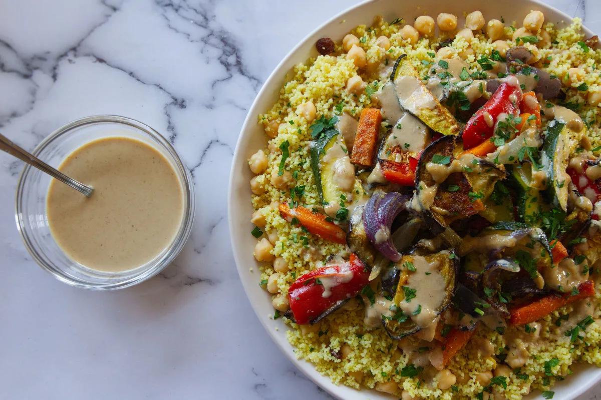 A large plate of Moroccan couscous with roast veggies.