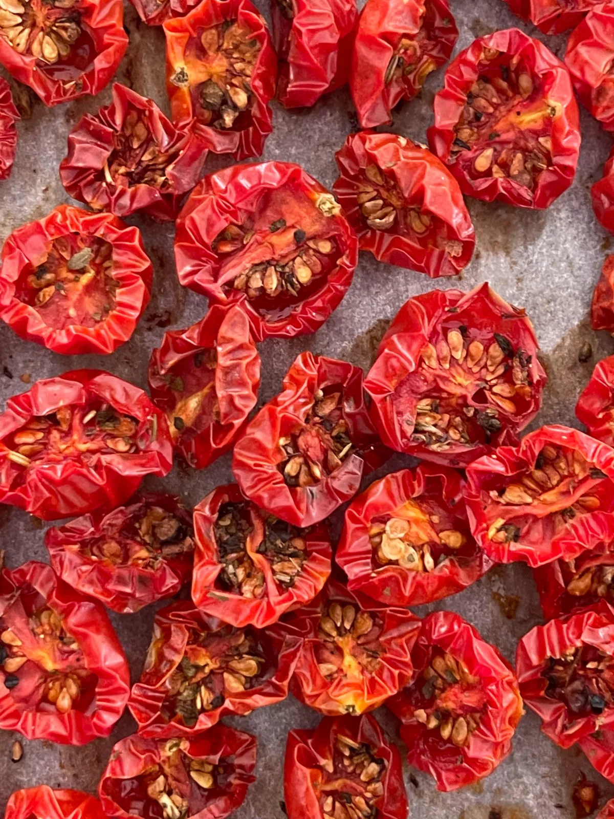 sun-dried tomatoes on a baking tray.