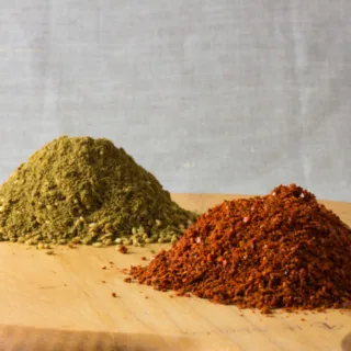Two piles of Middle Eastern Spices, Za'Atar and Aleppo pepper