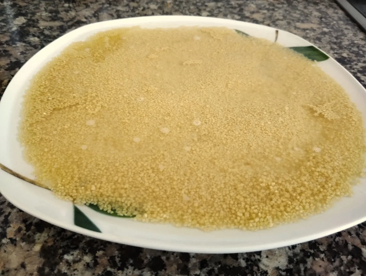 Couscous on a plate with water on the top