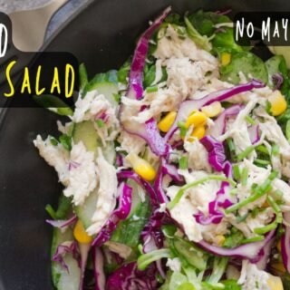 A bowl of shredded chicken salad.