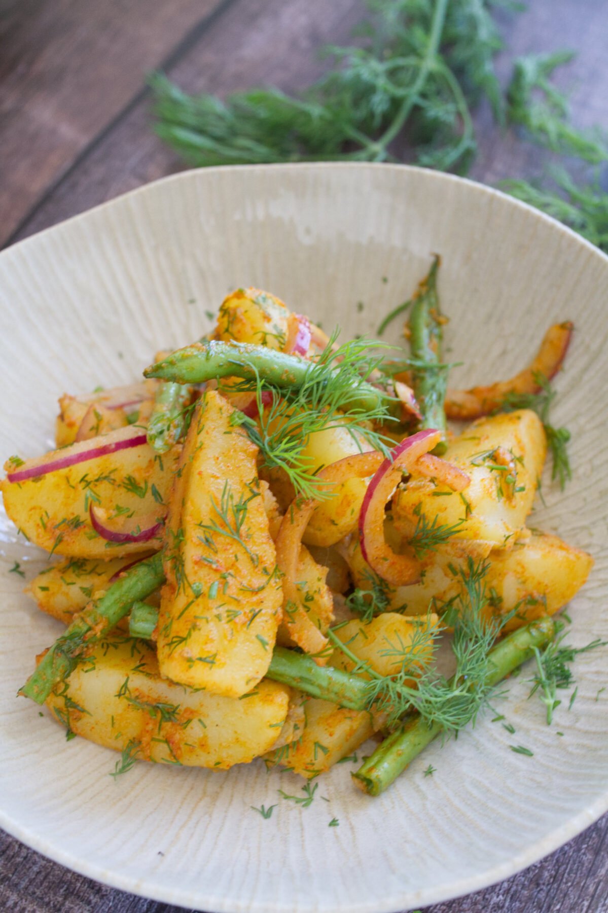 A bowl of Mediterranean potato salad