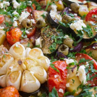 A sheet pan of roasted Mediterranean vegetables.