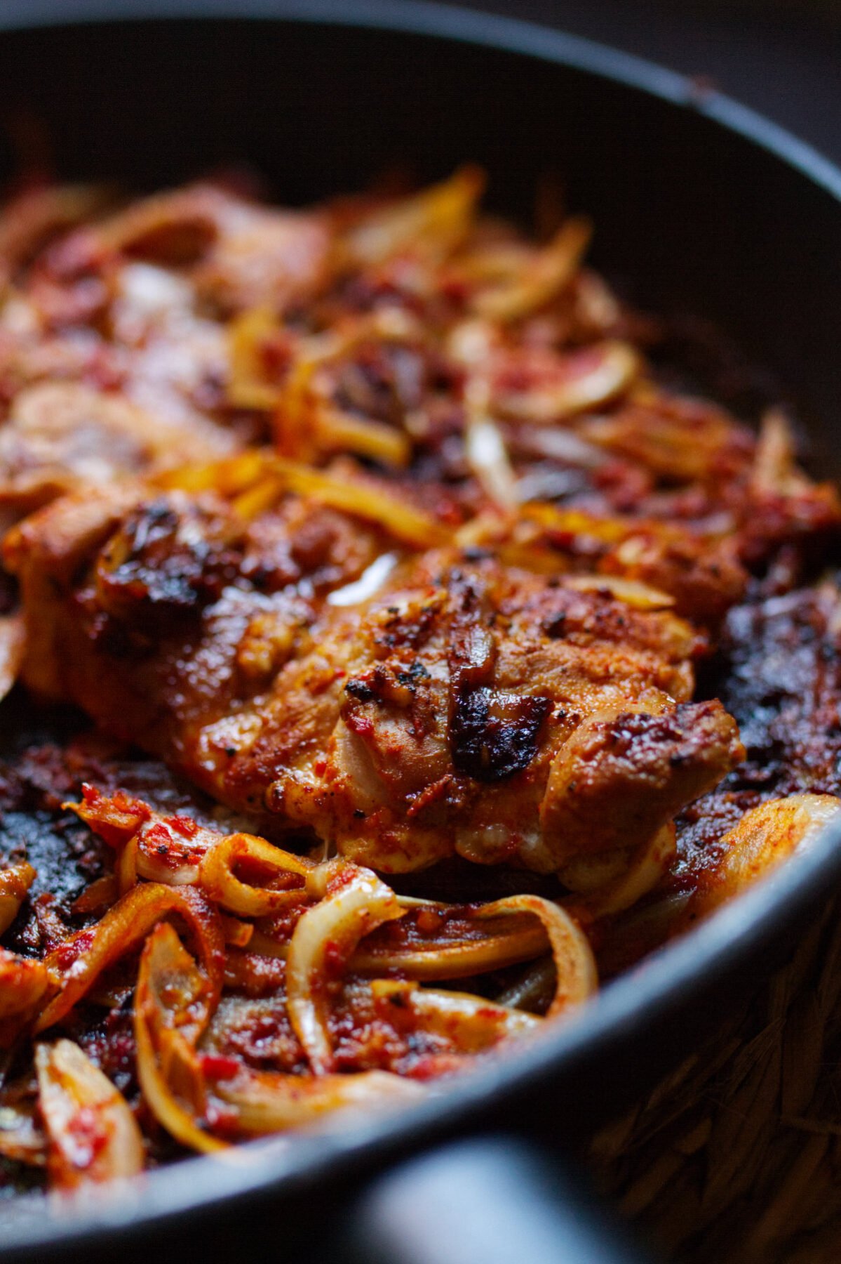 A large pan of harissa chicken