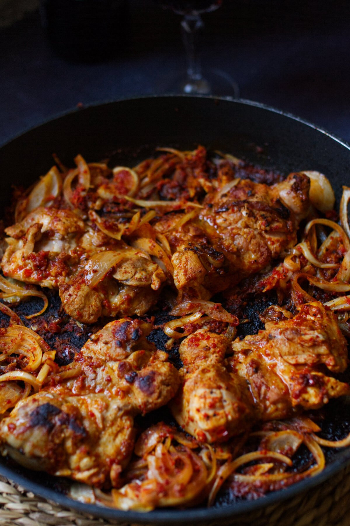 A large pan of harissa chicken