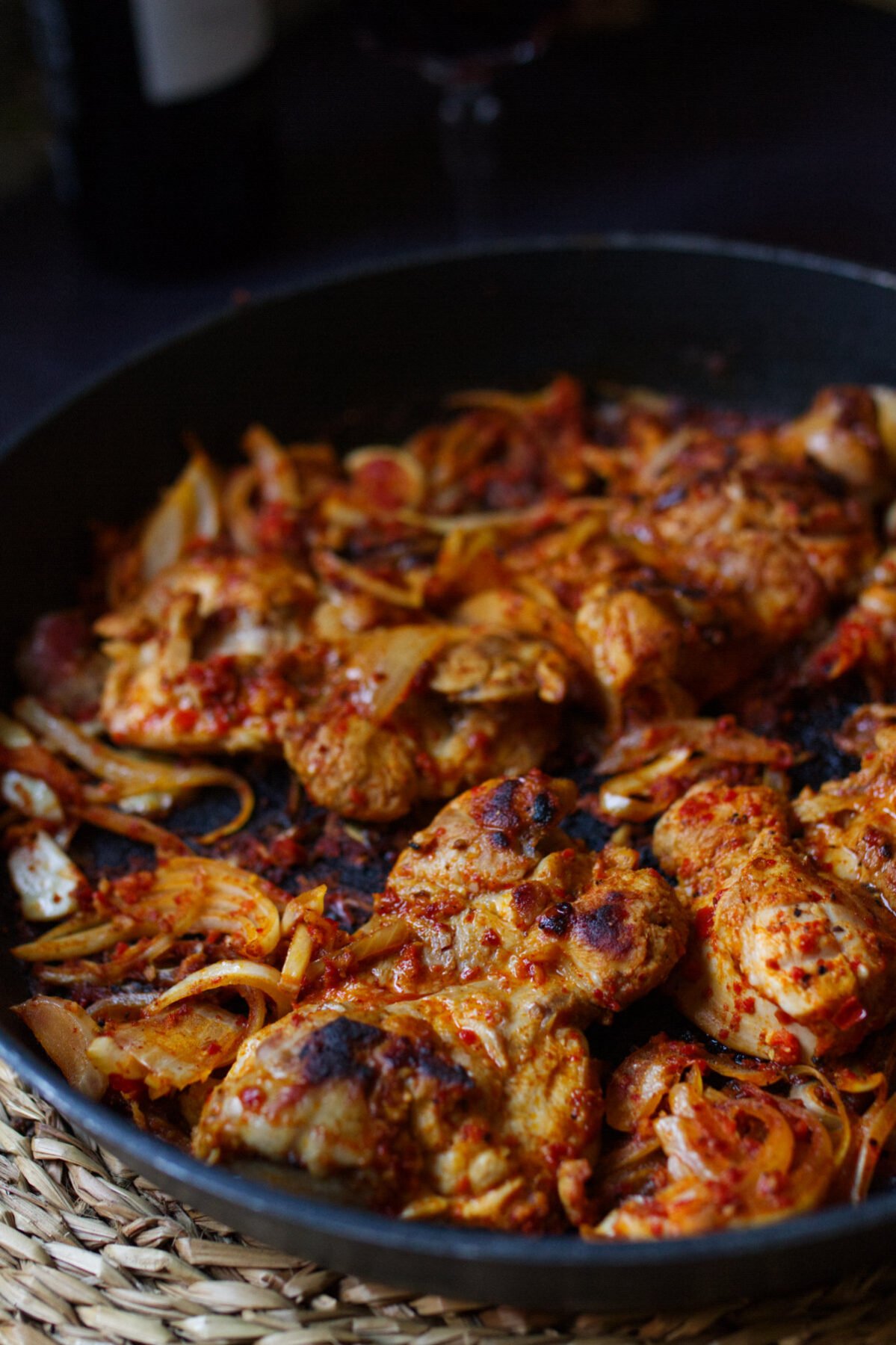 A large pan of harissa chicken