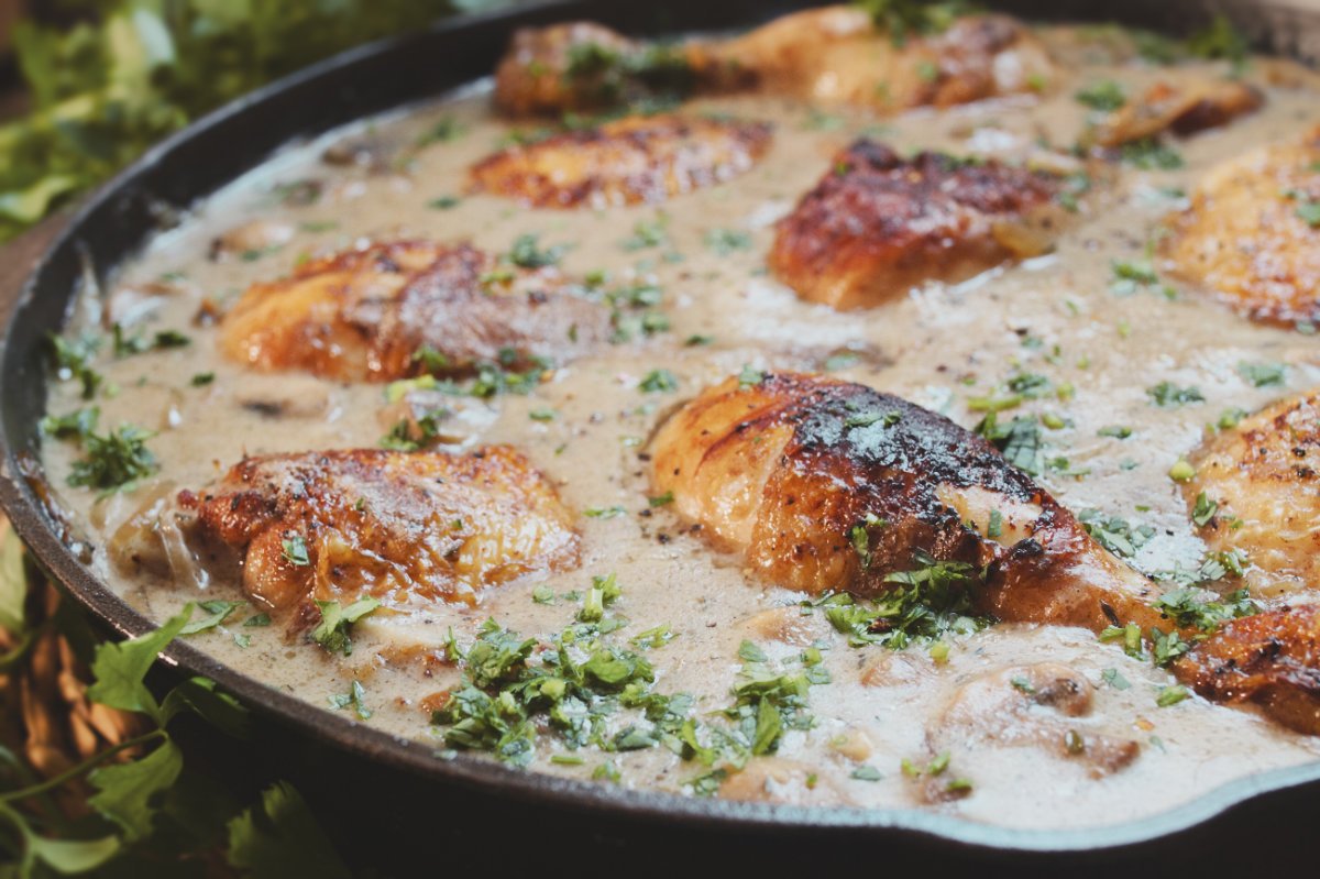 a large pan of chicken fricasssee