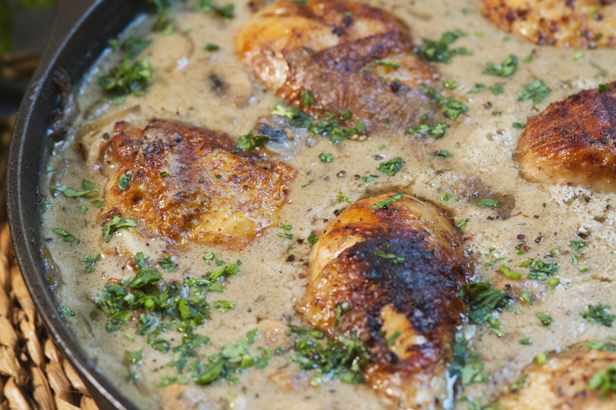 a large pan of chicken fricasssee