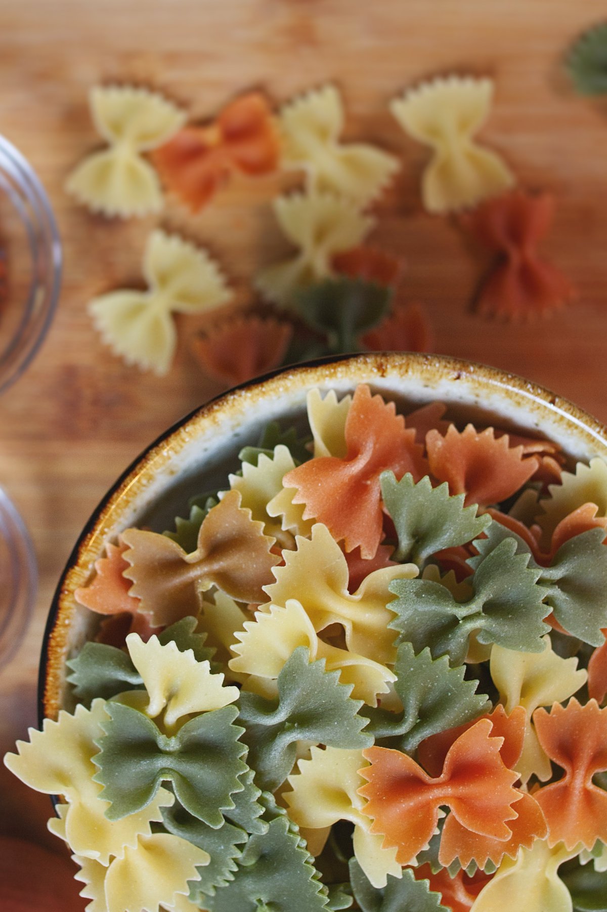 A bowl of uncooked farfalle pasta