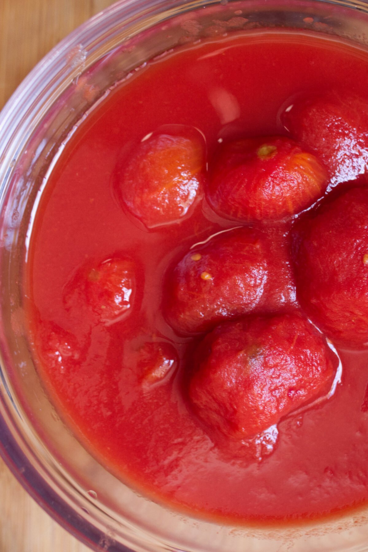 Some plum tomatoes in a bowl