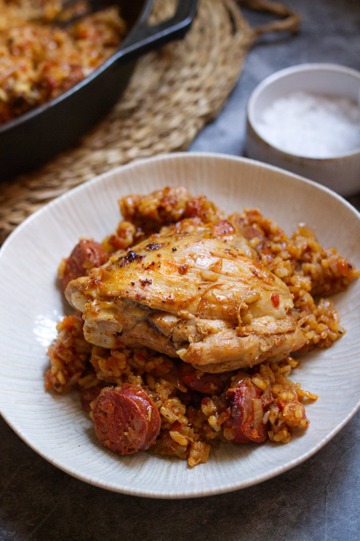 chicken-chorizo-rice-v5 - happymediterranean.com A bowl of Spanish-style chicken chorizo and rice