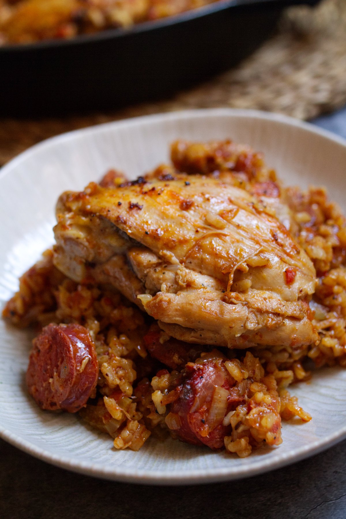 chicken-chorizo-rice-v7 - happymediterranean.com A bowl of Spanish-style chicken chorizo and rice
