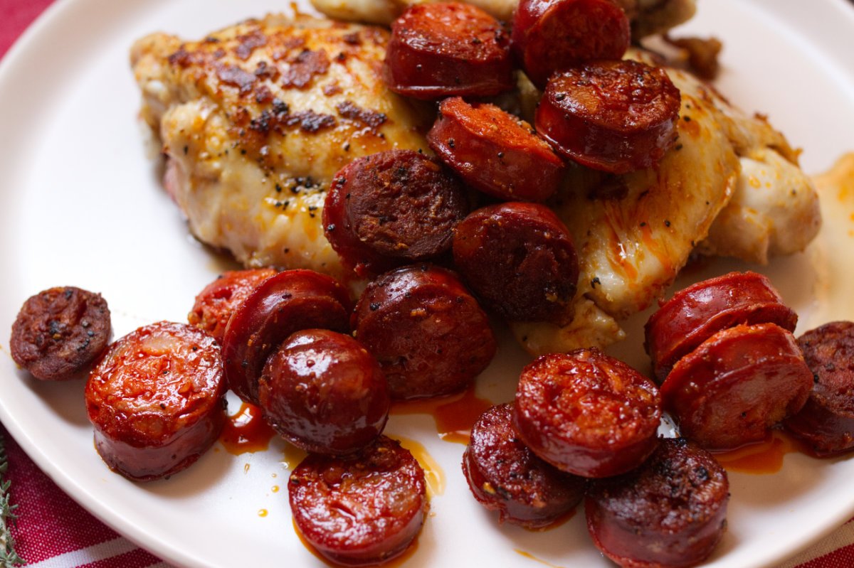chorizo-cooked - happymediterranean.com Cooked chicken thighs and red Spanish chorizo
