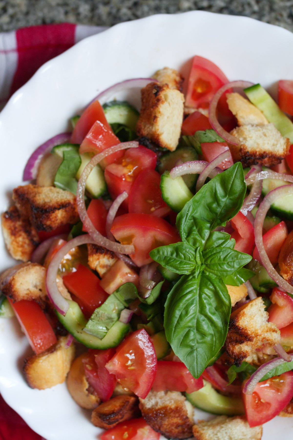 Panzanella Salad-v5 - happymediterranean.com A bowl of Panzanella salad