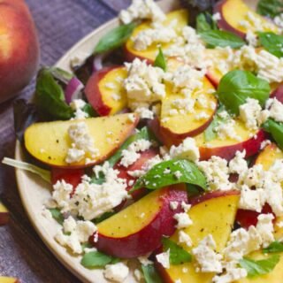 a platter of peach and feta salad