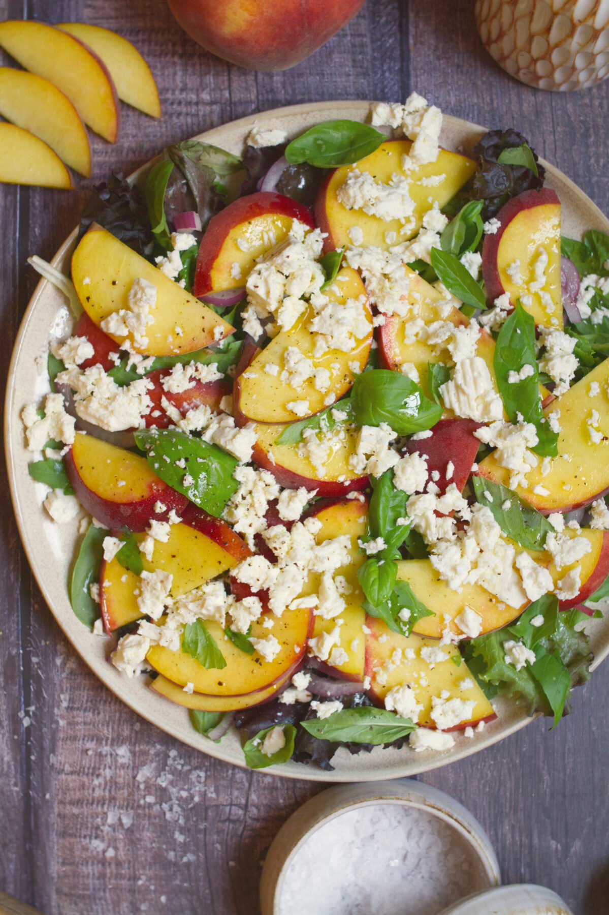 a platter of peach and feta salad