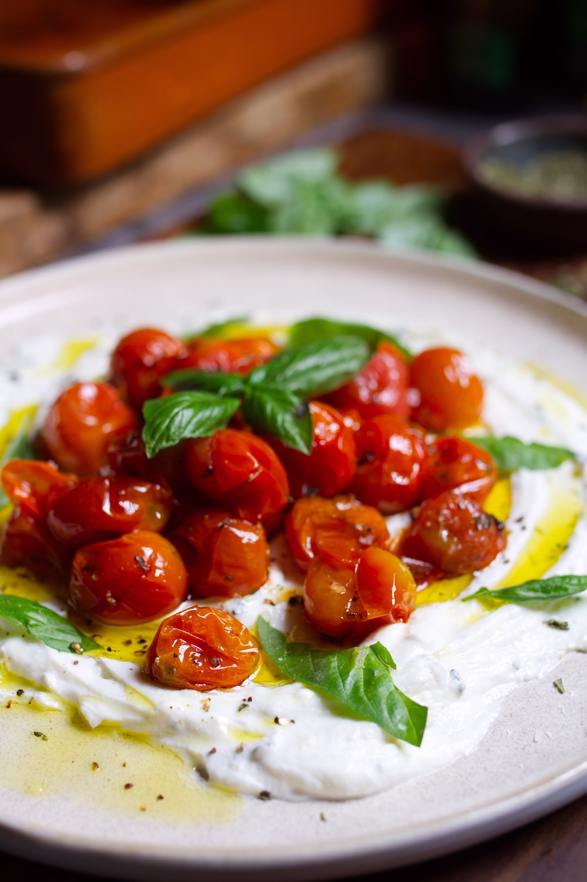 Creamy whipped ricotta appetizer with roasted cherry tomatoes