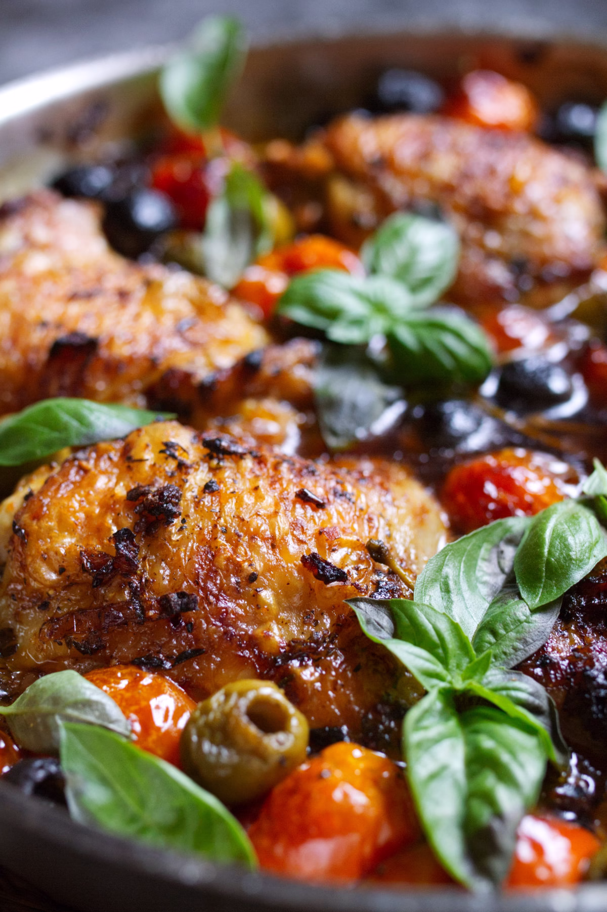 A pan of Mediterranean Chicken with Olives and Tomatoes