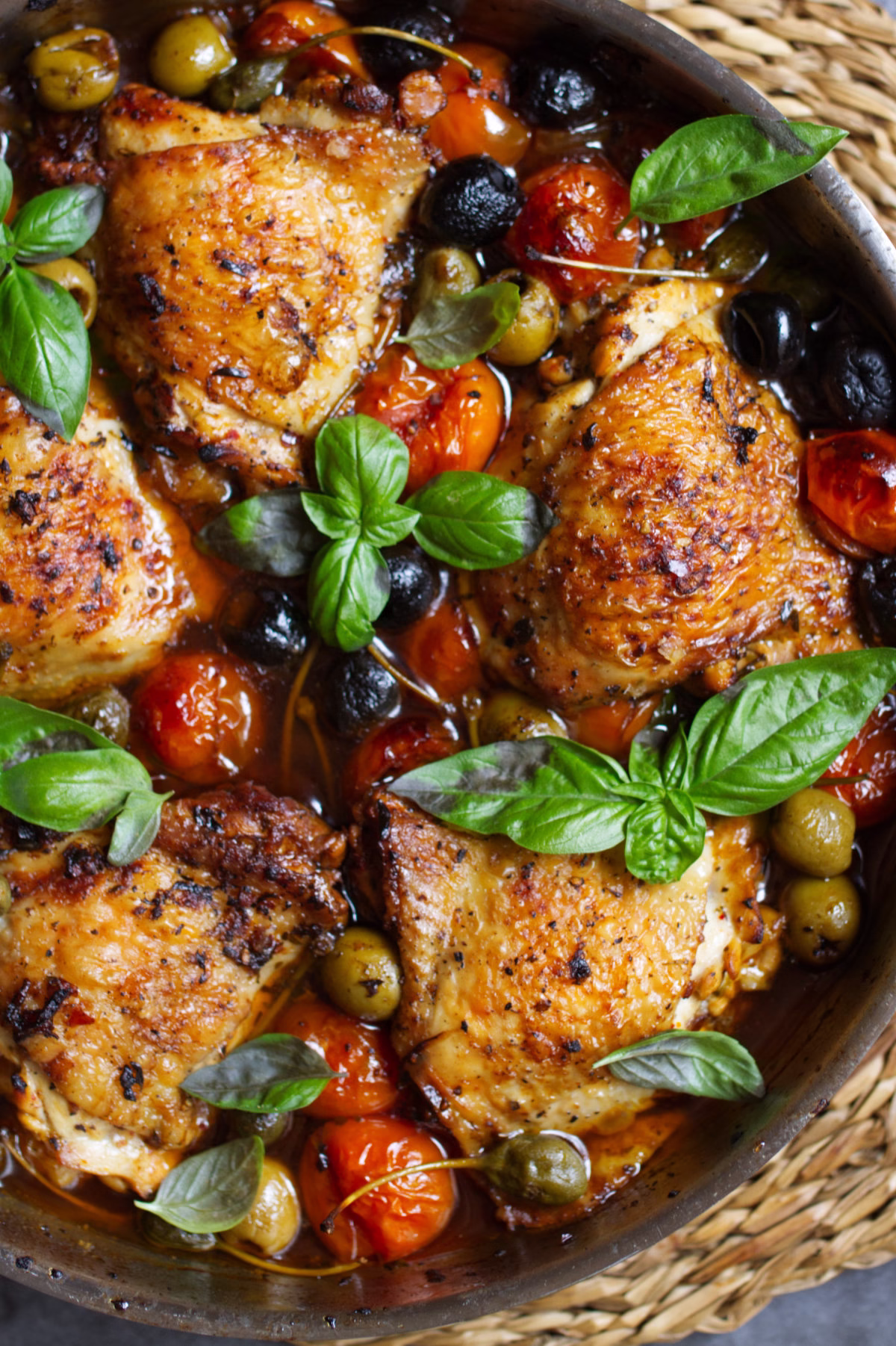 A pan of Mediterranean Chicken with Olives and Tomatoes