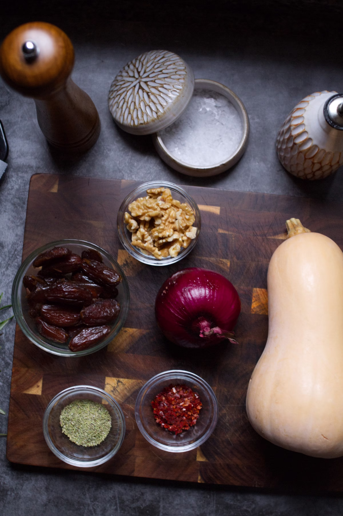 roasted-butternut-squash-ingredients-v1 - happymediterranean.com some ingredient used to make roasted butternut squash sit on a kitchen countertop