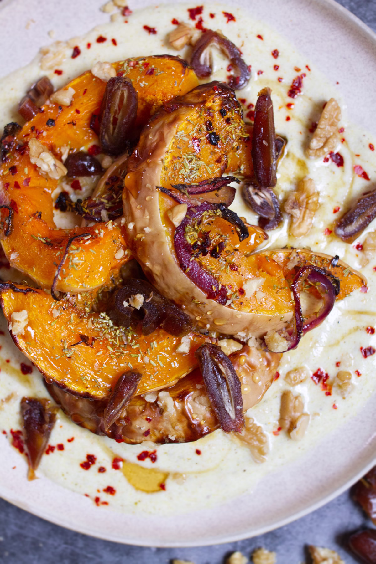 roasted butternut squash-v26 - happymediterranean.com A plate of roasted butternut squash with dates and walnuts