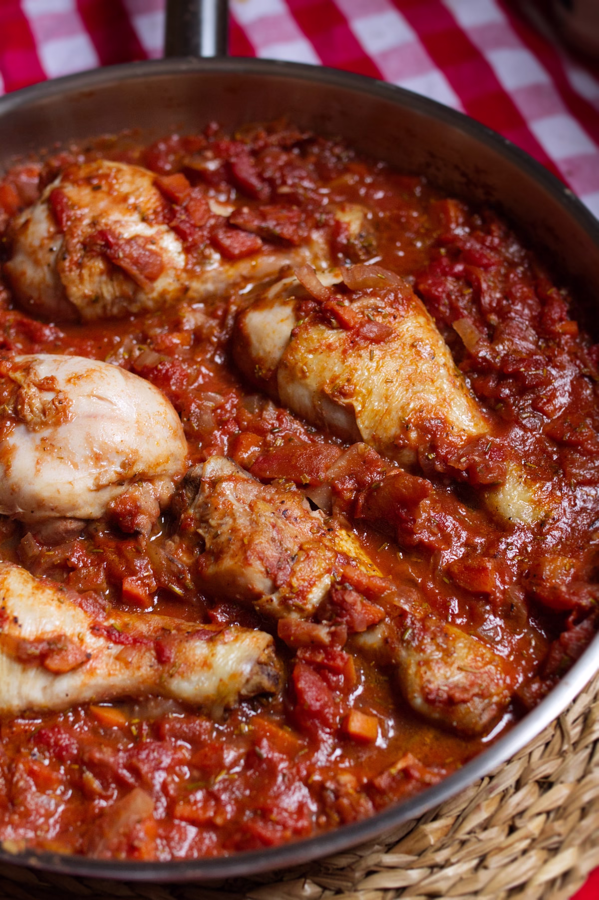 Pollo alla Cacciatora-v15 - happymediterranean.com A large pan of Pollo alla Cacciatora sits waiting to be served