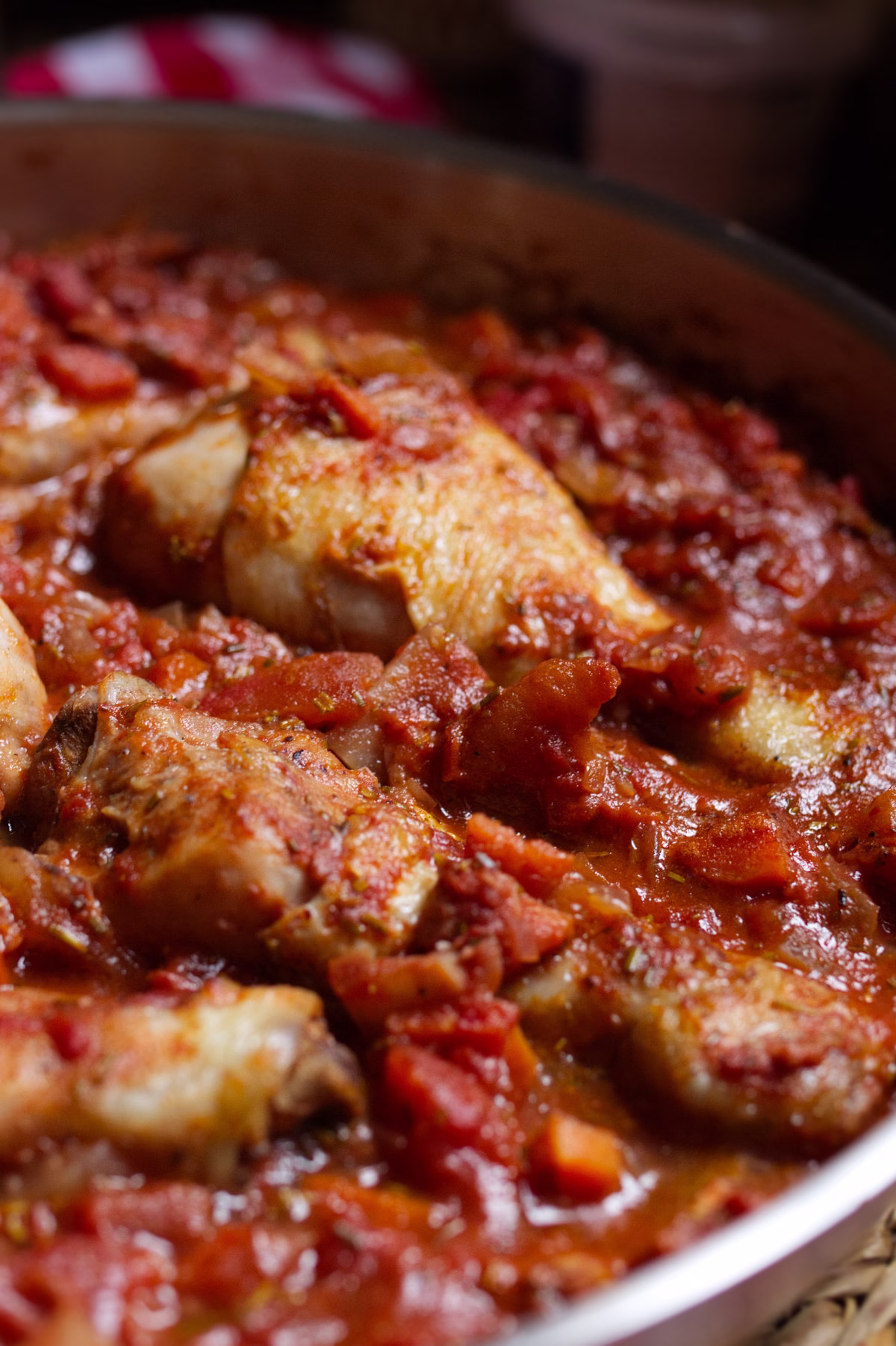 Pollo alla Cacciatora-v18 - happymediterranean.com A large pan of Pollo alla Cacciatora sits waiting to be served