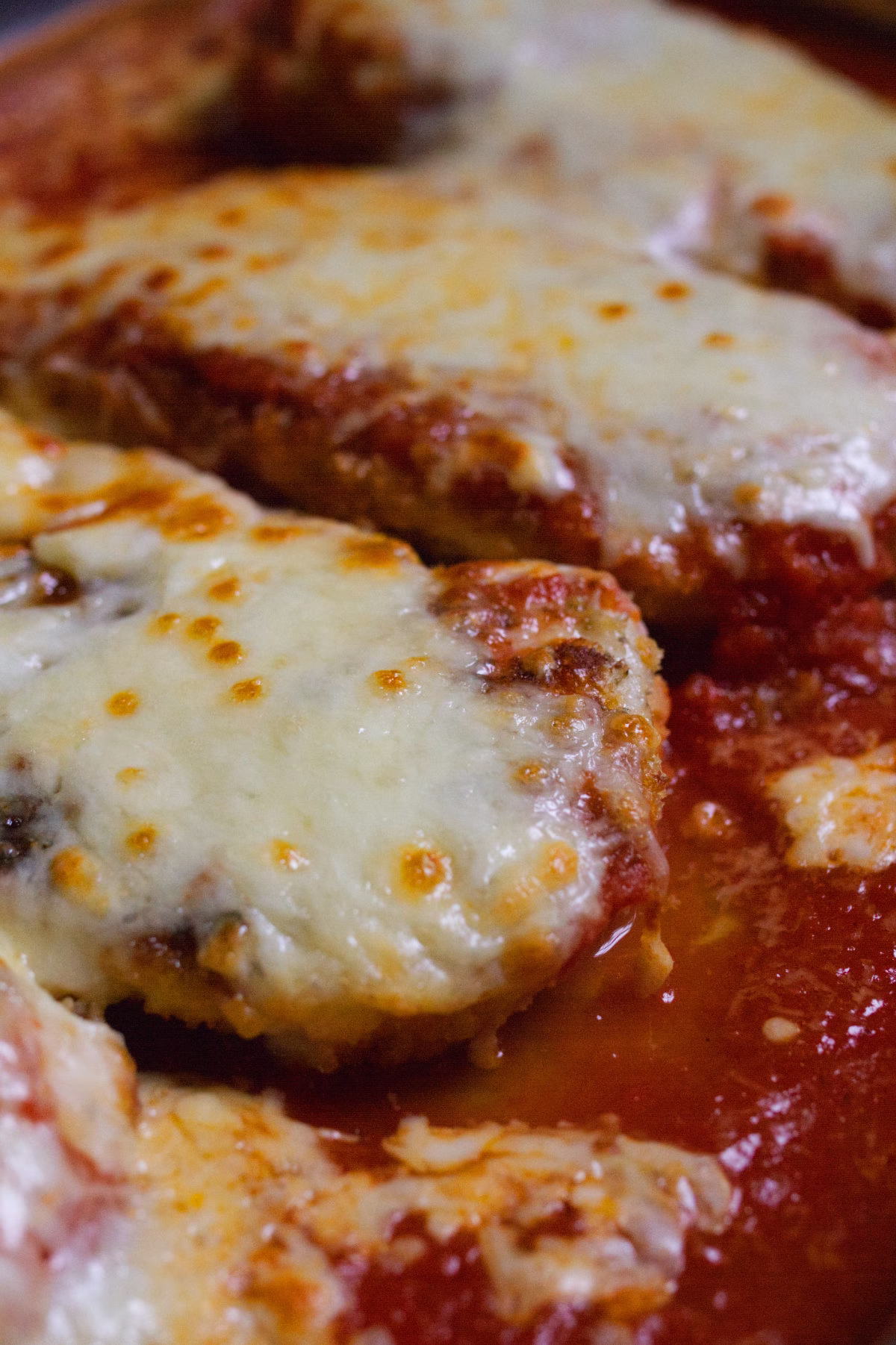 Chicken-Parmigiana-v3 - happymediterranean.com A pan of Chicken Parmigiana - Pollo alla Parmigiana