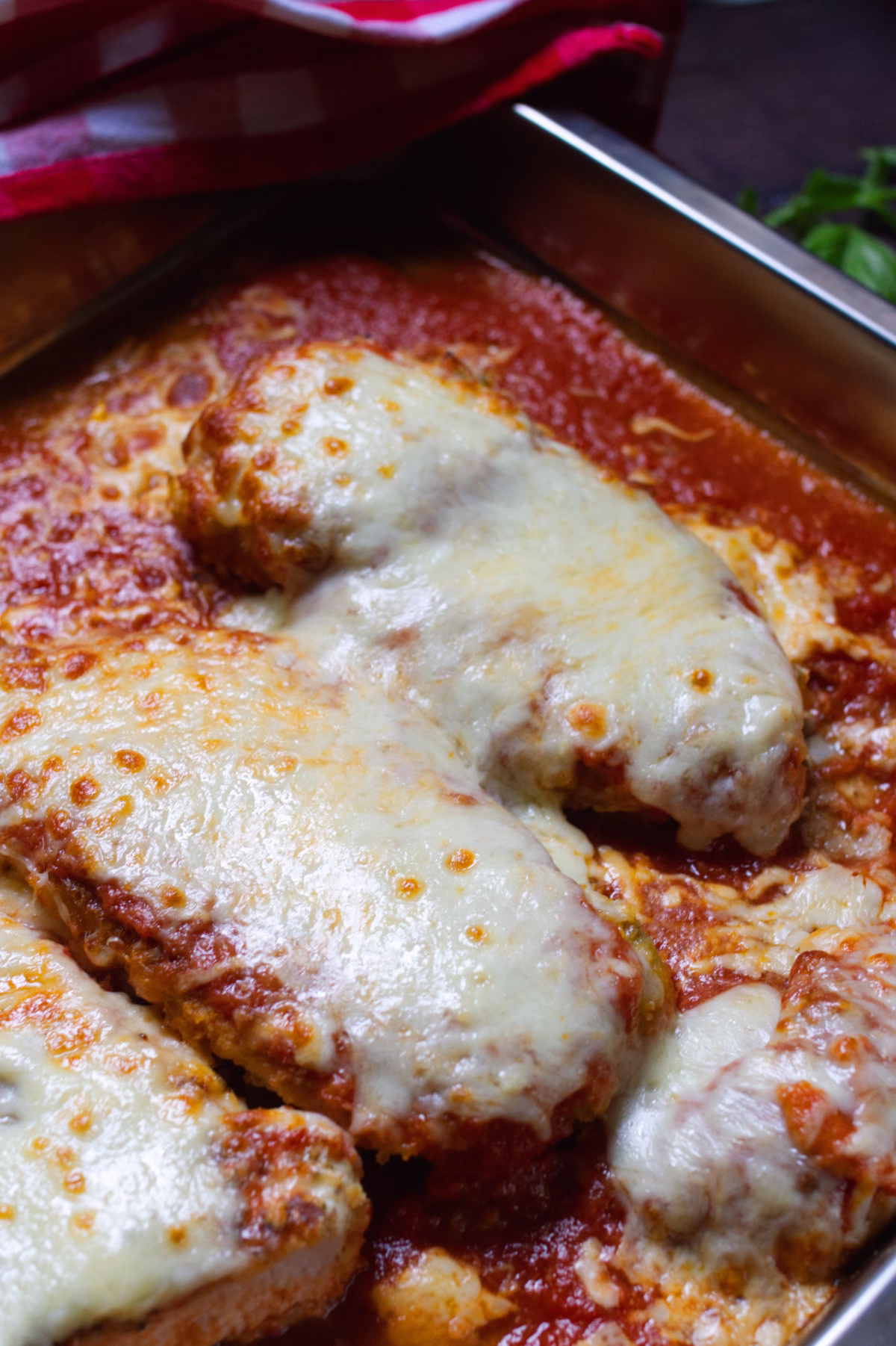 Chicken-Parmigiana-v36 - happymediterranean.com A pan of Chicken Parmigiana - Pollo alla Parmigiana